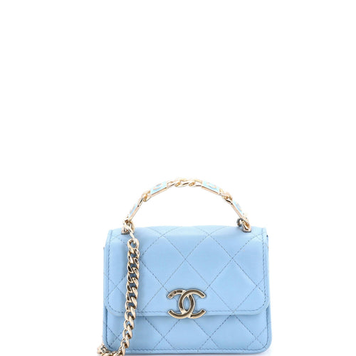 https://cdn.shopify.com/s/files/1/0384/0161/files/395455-1_20Chanel_20Coco_20Enamel_20Top_20Handle_20Flap_20Clutch_20with_20Chain_20Quilted_20Lambskin_2D_0002.jpg?v=1764959807