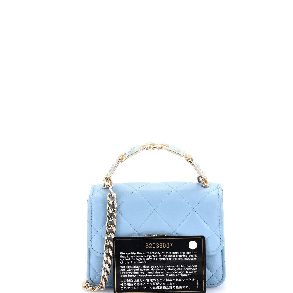 https://cdn.shopify.com/s/files/1/0384/0161/files/395455-1_20Chanel_20Coco_20Enamel_20Top_20Handle_20Flap_20Clutch_20with_20Chain_20Quilted_20Lambskin_2D_0003.jpg?v=1764959807