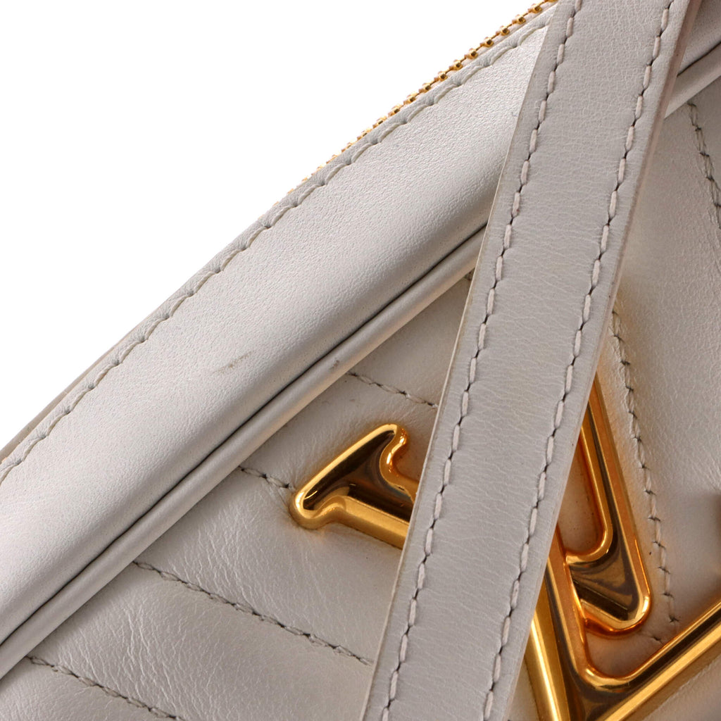 https://cdn.shopify.com/s/files/1/0384/0161/files/419065-1_20Louis_20Vuitton_20New_20Wave_20Camera_20Bag_20Quilted_20Leather_2D_0008.jpg?v=1775235874